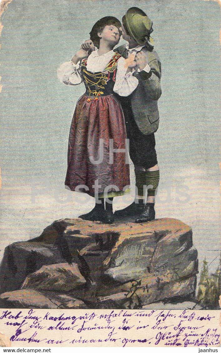 couple - woman and man - folk costumes - Serie 412 - old postcard - 1910 - used - JH Postcards